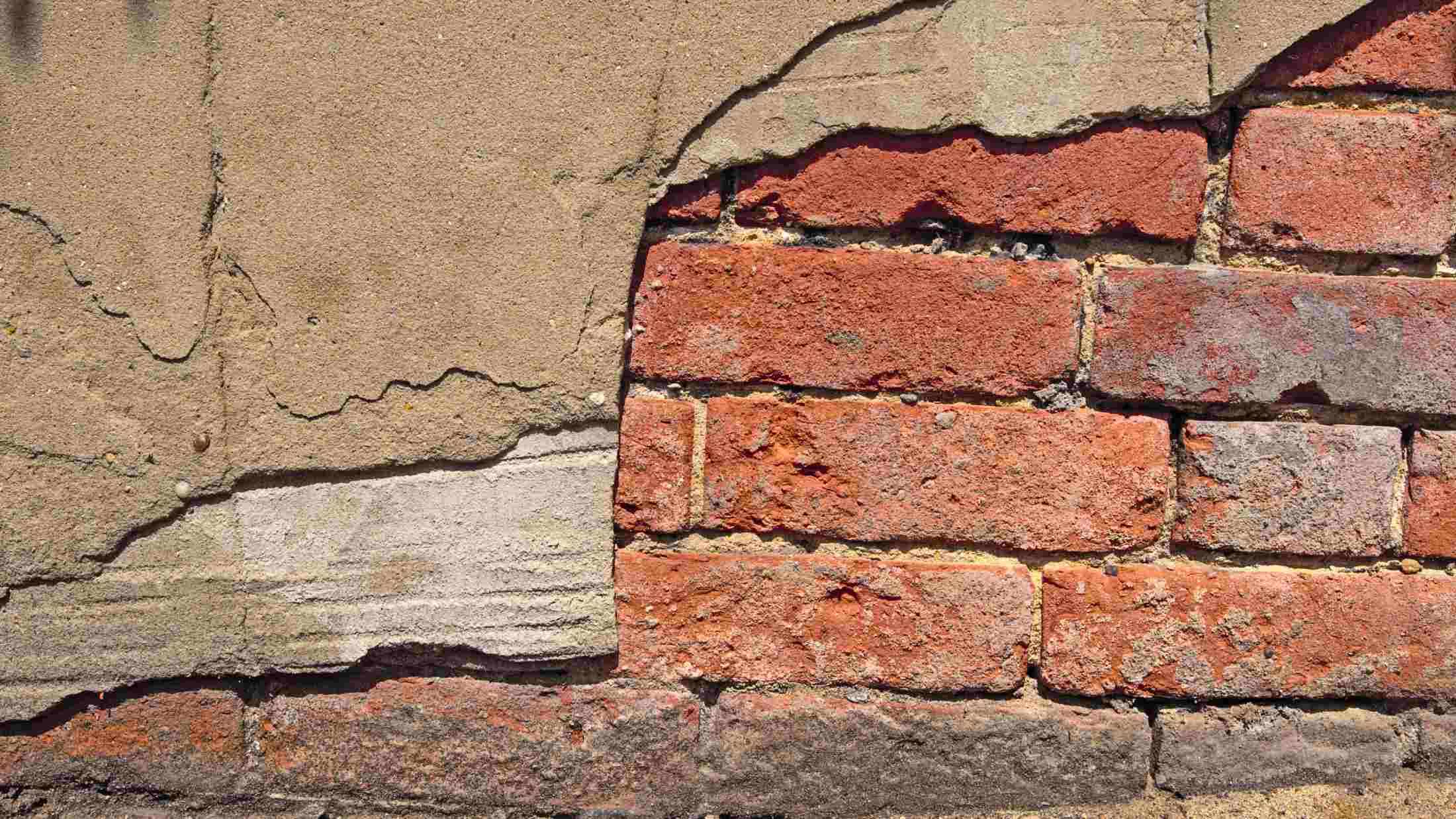 Close up of a brick wall showing signs of subsidence